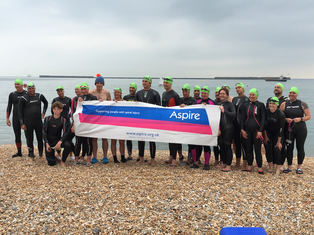 A group of swimmers about to cross the Solent 
