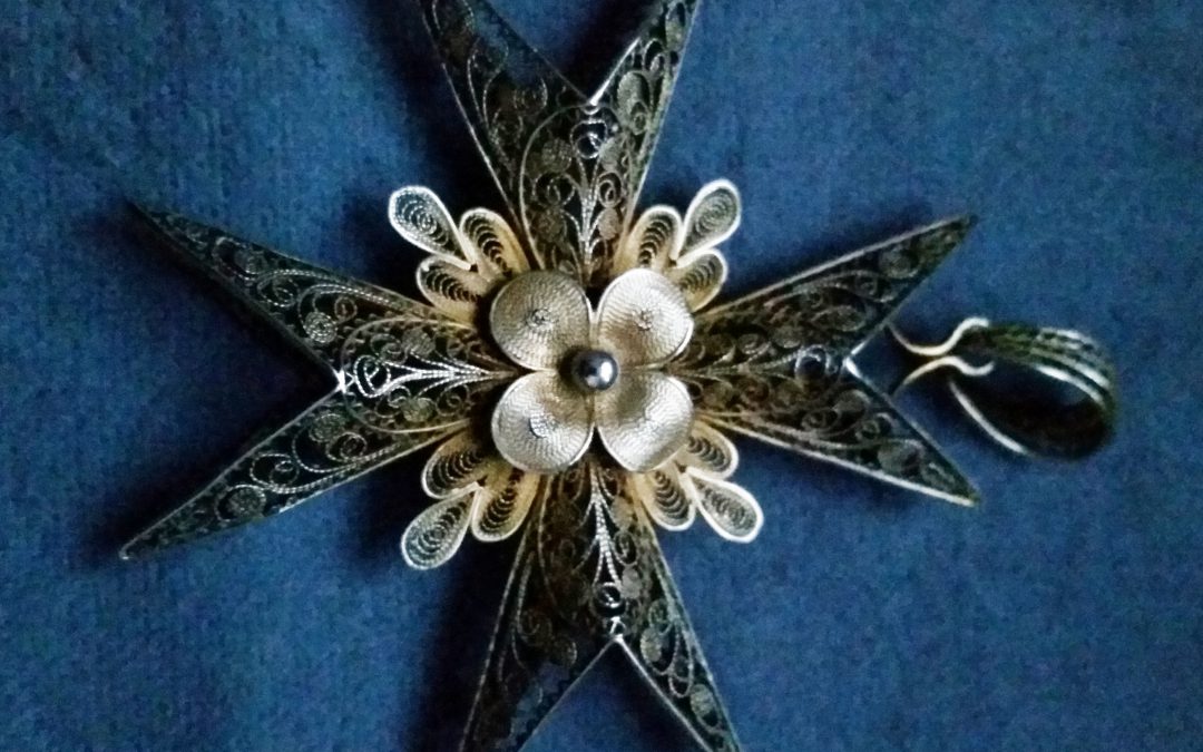 Filigree Maltese cross.